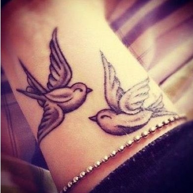 dove tattoos on wrist