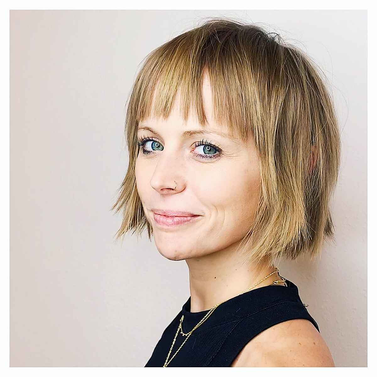 35+ Chic Short Layered Bob with Bangs for an Eye-Catching Crop