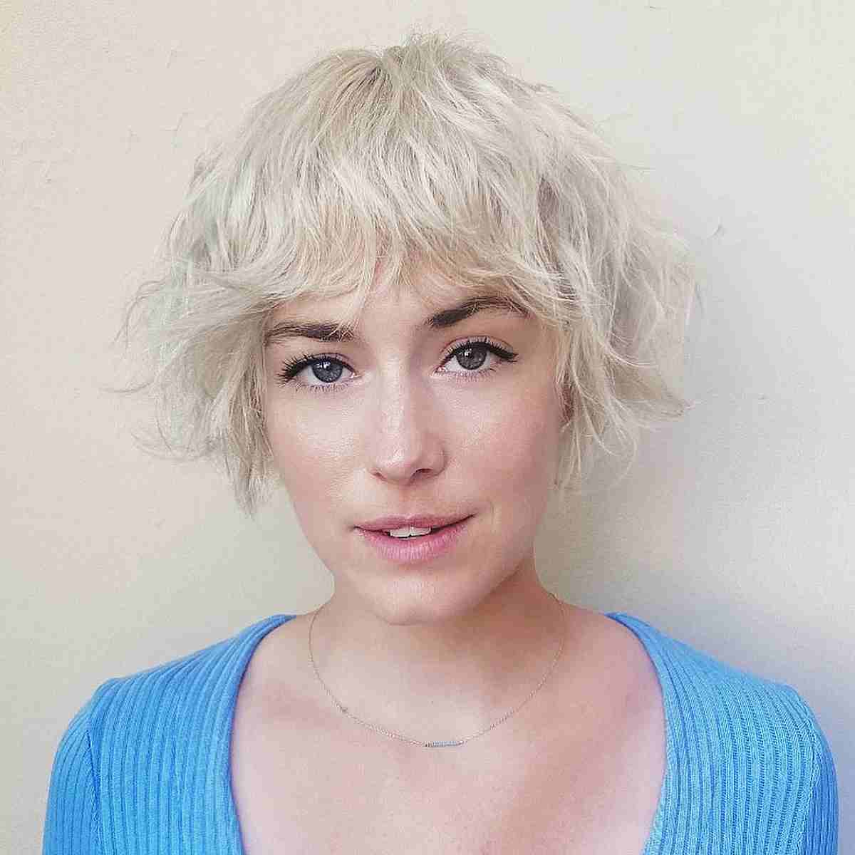 25 Cutest Wavy Bobs with Bangs Women Are Getting Right Now