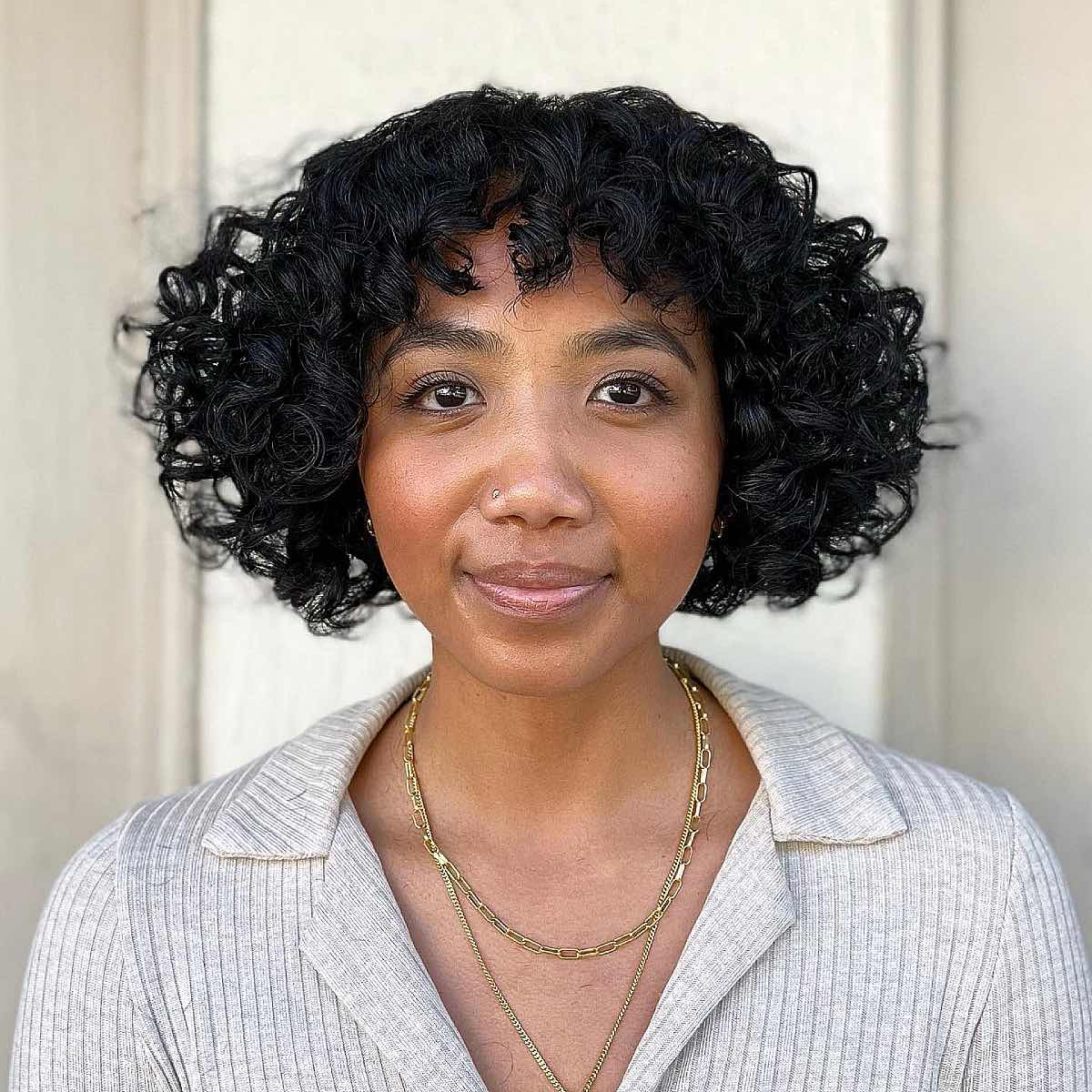 41 Best Short Curly Hair with Bangs to Try This Year