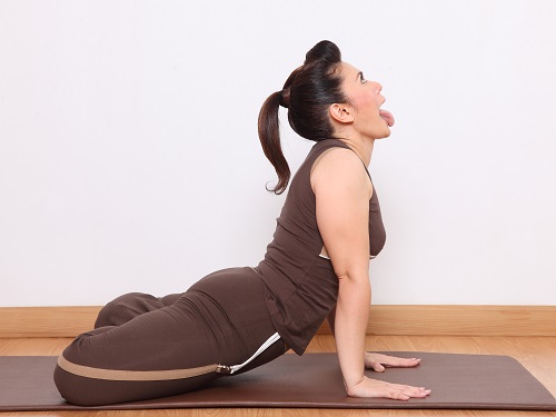 15 Yoga Asanas to Improve Your Thyroid Health