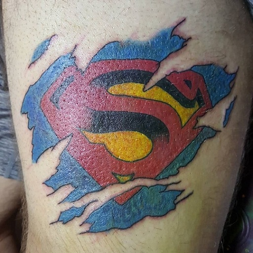 9 Amazing Ripped Skin Tattoo Designs And Ideas