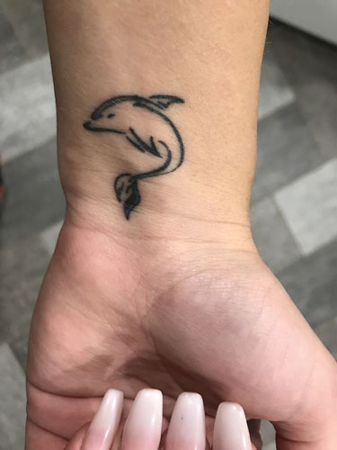 15+ Amazing Dolphin Tattoo Designs and their Meanings