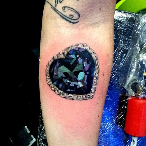 12 Stunning Jewel Tattoo Designs for a Touch of Glamour