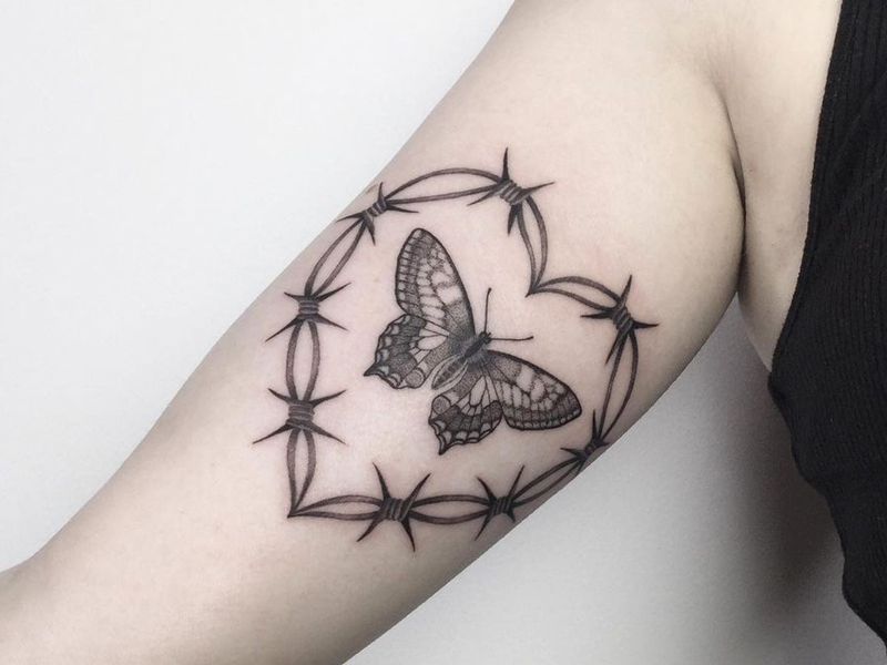 10 Bold and Captivating Barbed Wire Tattoo Designs