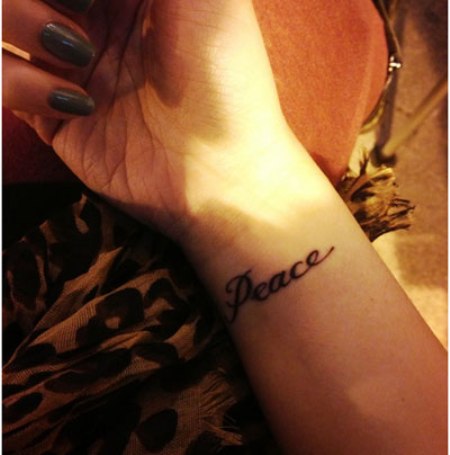 15 Best Peace Tattoo Designs to Enhance Your Beauty