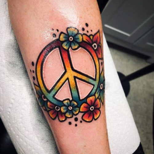 15 Best Peace Tattoo Designs to Enhance Your Beauty