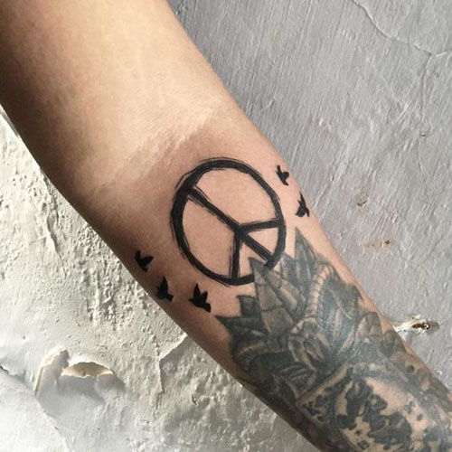15 Best Peace Tattoo Designs to Enhance Your Beauty