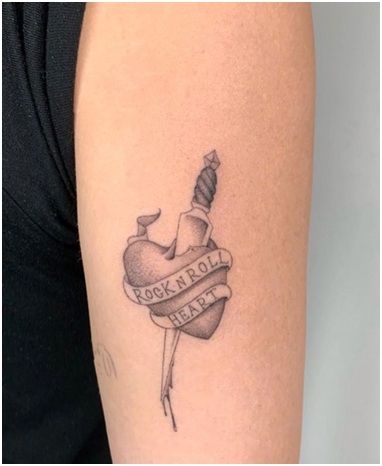 15 Best Miley Cyrus Tattoo Designs, Meanings, and Photos