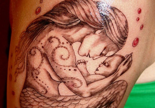 15 Simple and Traditional Mermaid Tattoo Designs