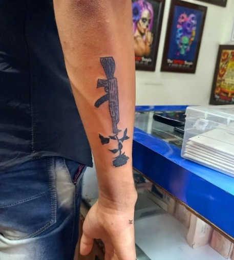 15 Exploding AK-47 Tattoo Designs for Gun Enthusiasts
