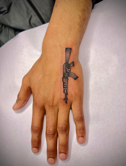 15 Exploding AK-47 Tattoo Designs for Gun Enthusiasts