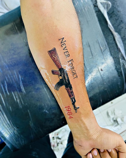 15 Exploding AK-47 Tattoo Designs for Gun Enthusiasts