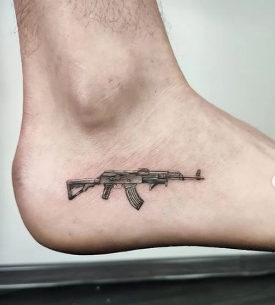 15 Exploding AK-47 Tattoo Designs for Gun Enthusiasts