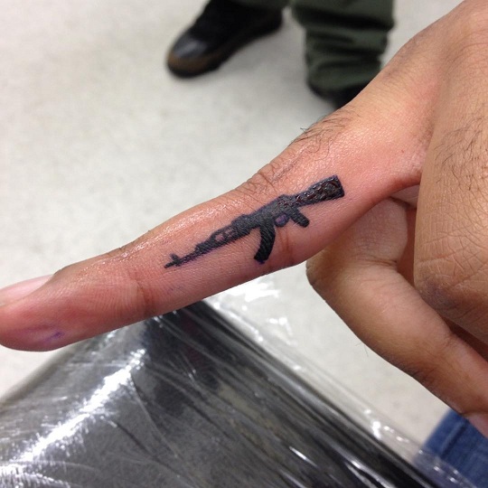 15 Exploding AK-47 Tattoo Designs for Gun Enthusiasts