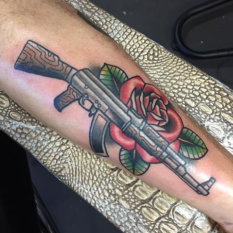 15 Exploding AK-47 Tattoo Designs for Gun Enthusiasts