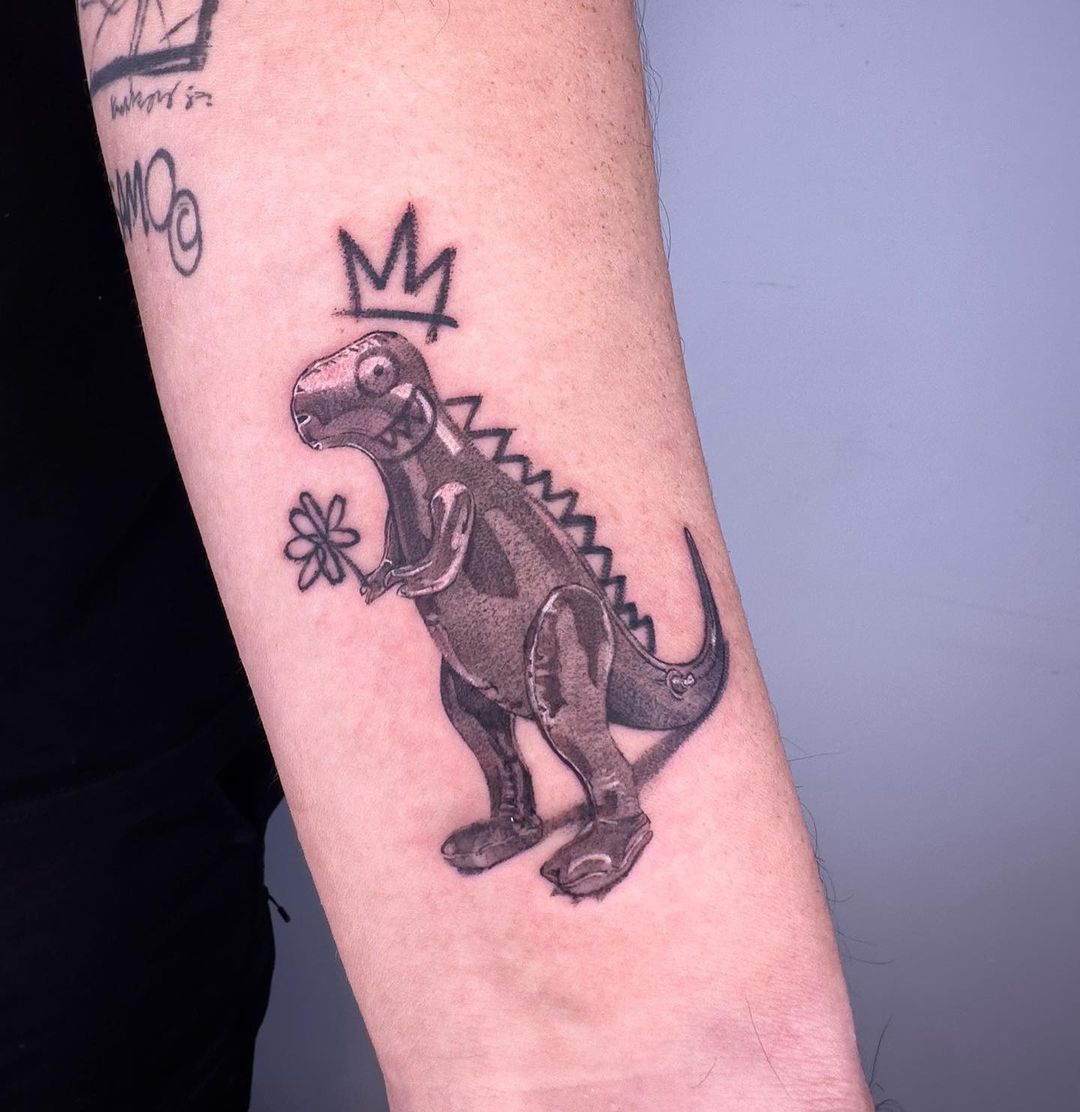 20+ Cute, Simple, and Realistic Dinosaur Tattoo Designs