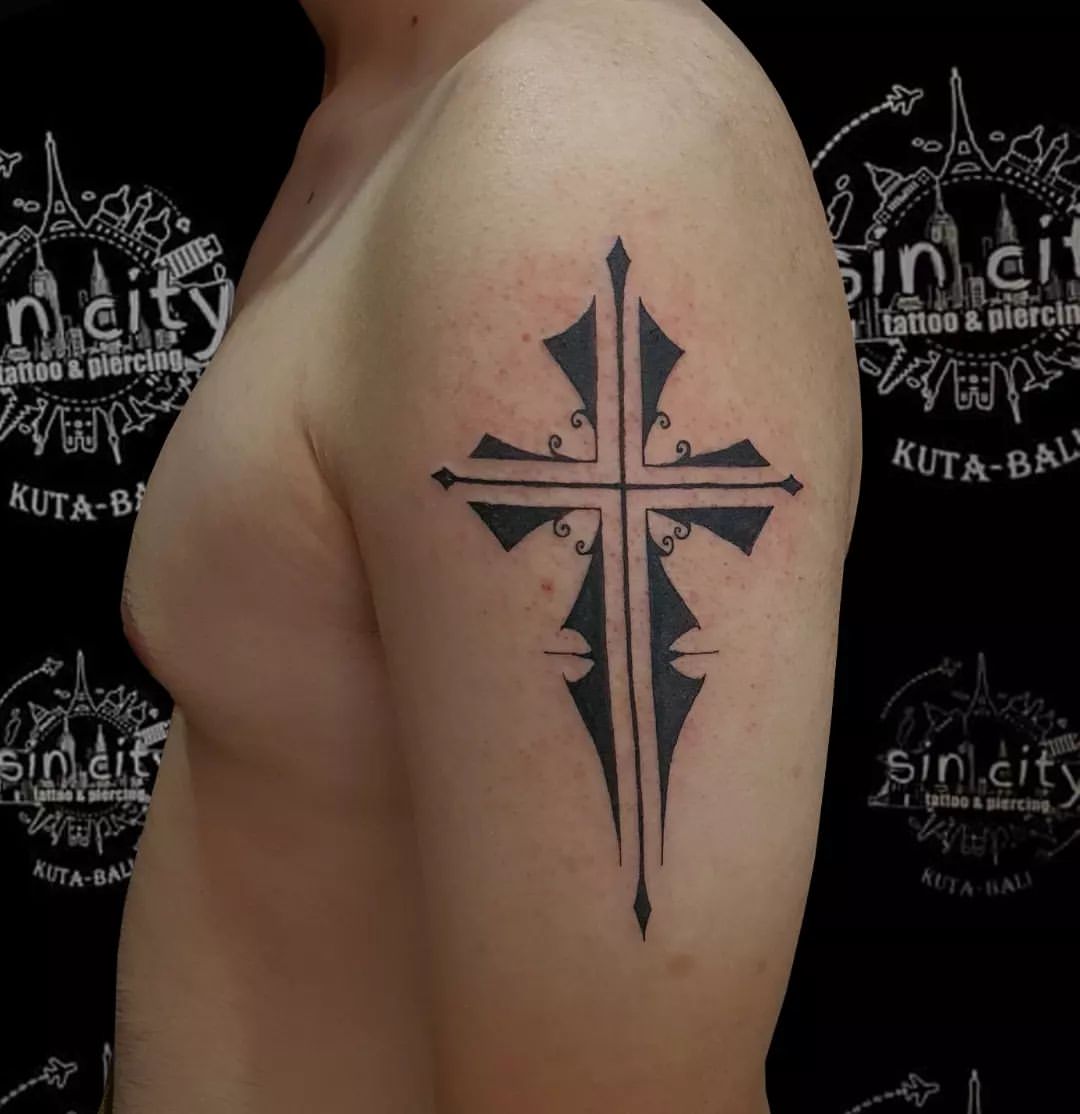 30+ Striking Tribal Cross Tattoo Designs Just For You 2024