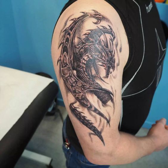 20+ Bold and Mystical Tribal Dragon Tattoo Designs