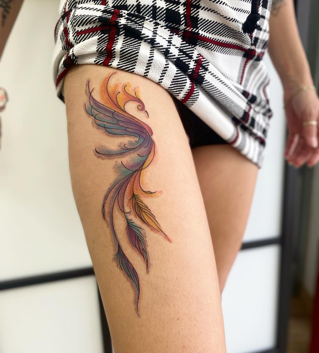 15 Phoenix Tattoo Designs That Celebrate Resilience