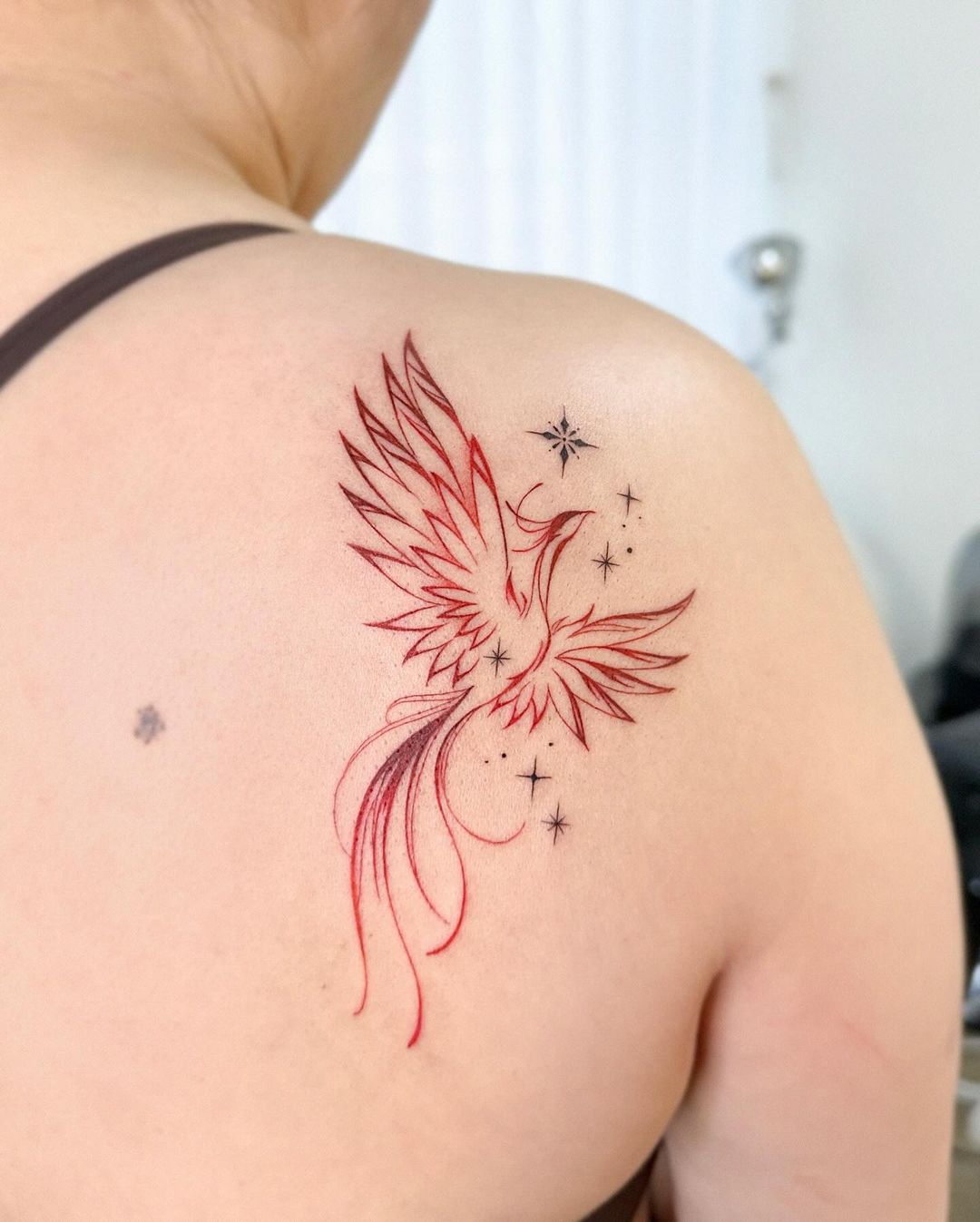 15 Phoenix Tattoo Designs That Celebrate Resilience