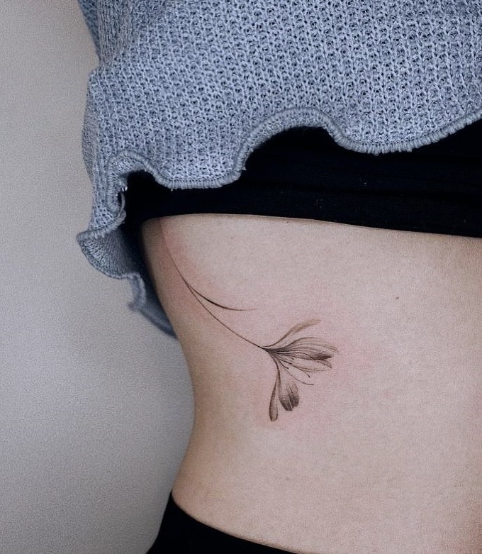 30+ Creative Rib Tattoo Designs for a Timeless Appeal