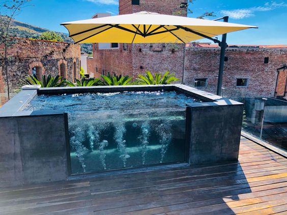 25 Stunning Rooftop Swimming Pool Ideas For Luxurious Escapes