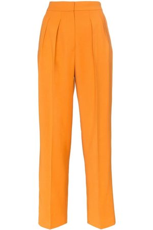 10 Comfortable Designs of Linen Trousers for Men and Women