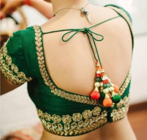 25 Trending Deep Neck Blouse Designs for Alluring Look